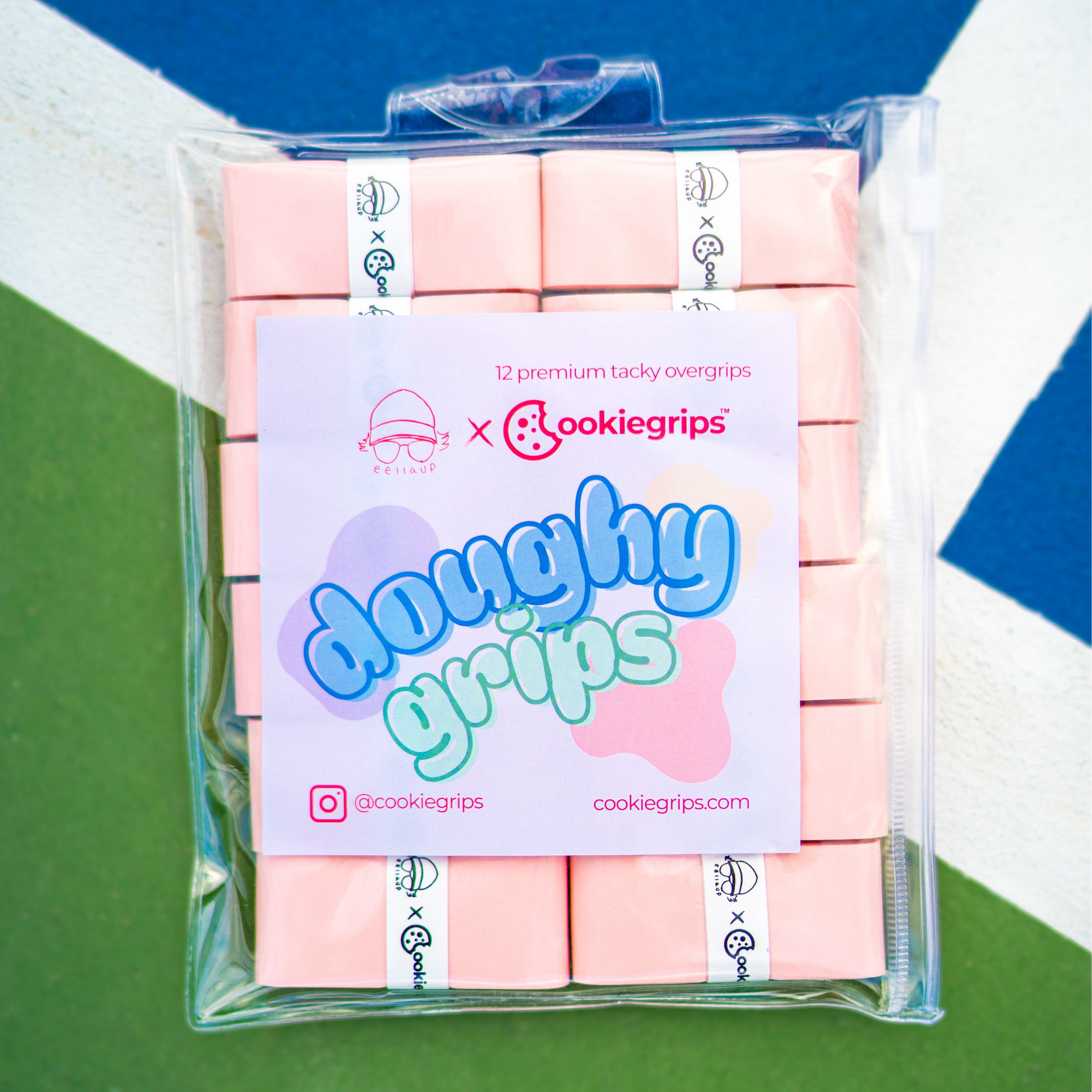eellaup x cookiegrips Strawberry Shortcake Doughy Grips on a blue, green and white pickleball court