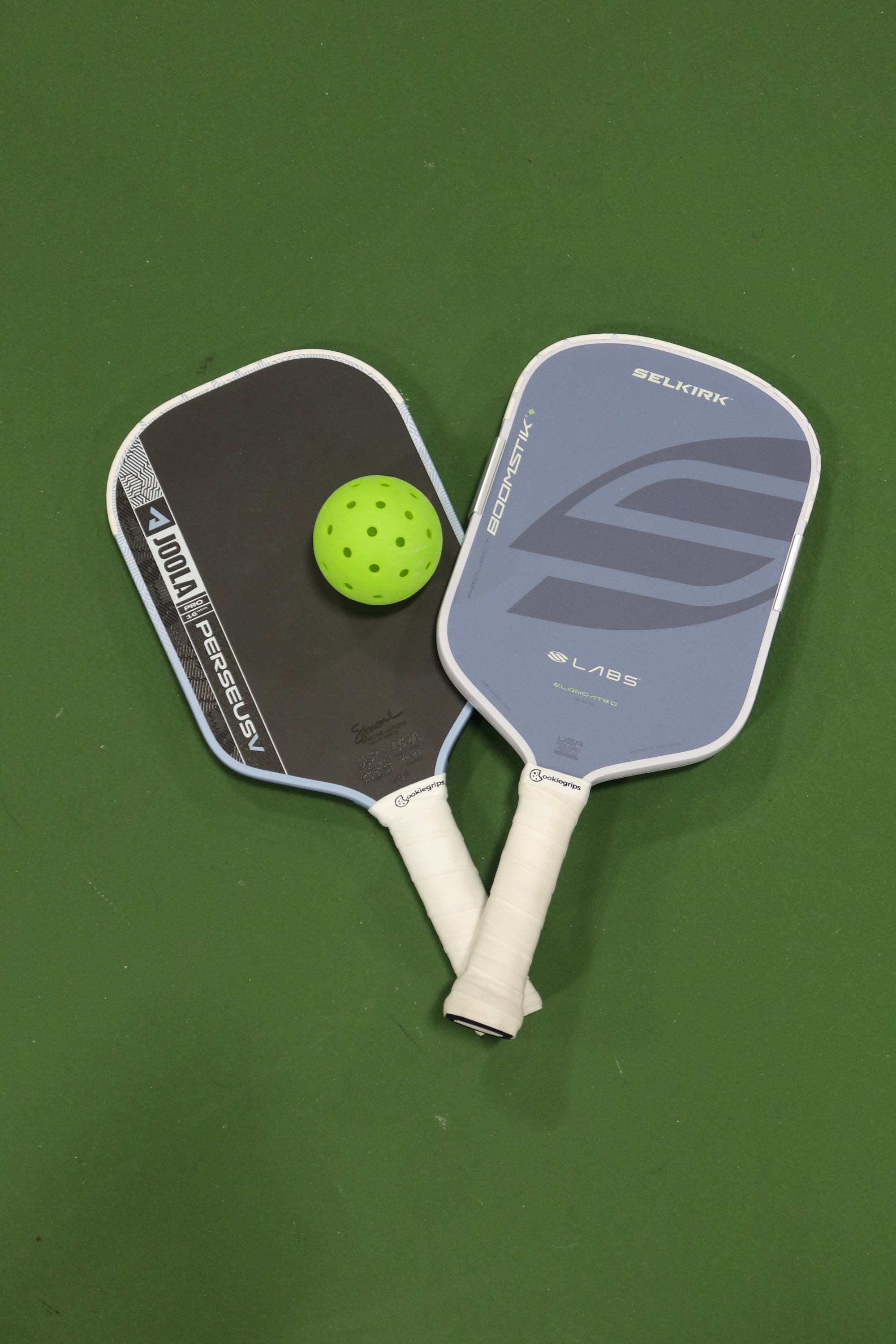 S'morey ultra tacky pickleball overgrip rolls beside an unwrapped paddle handle