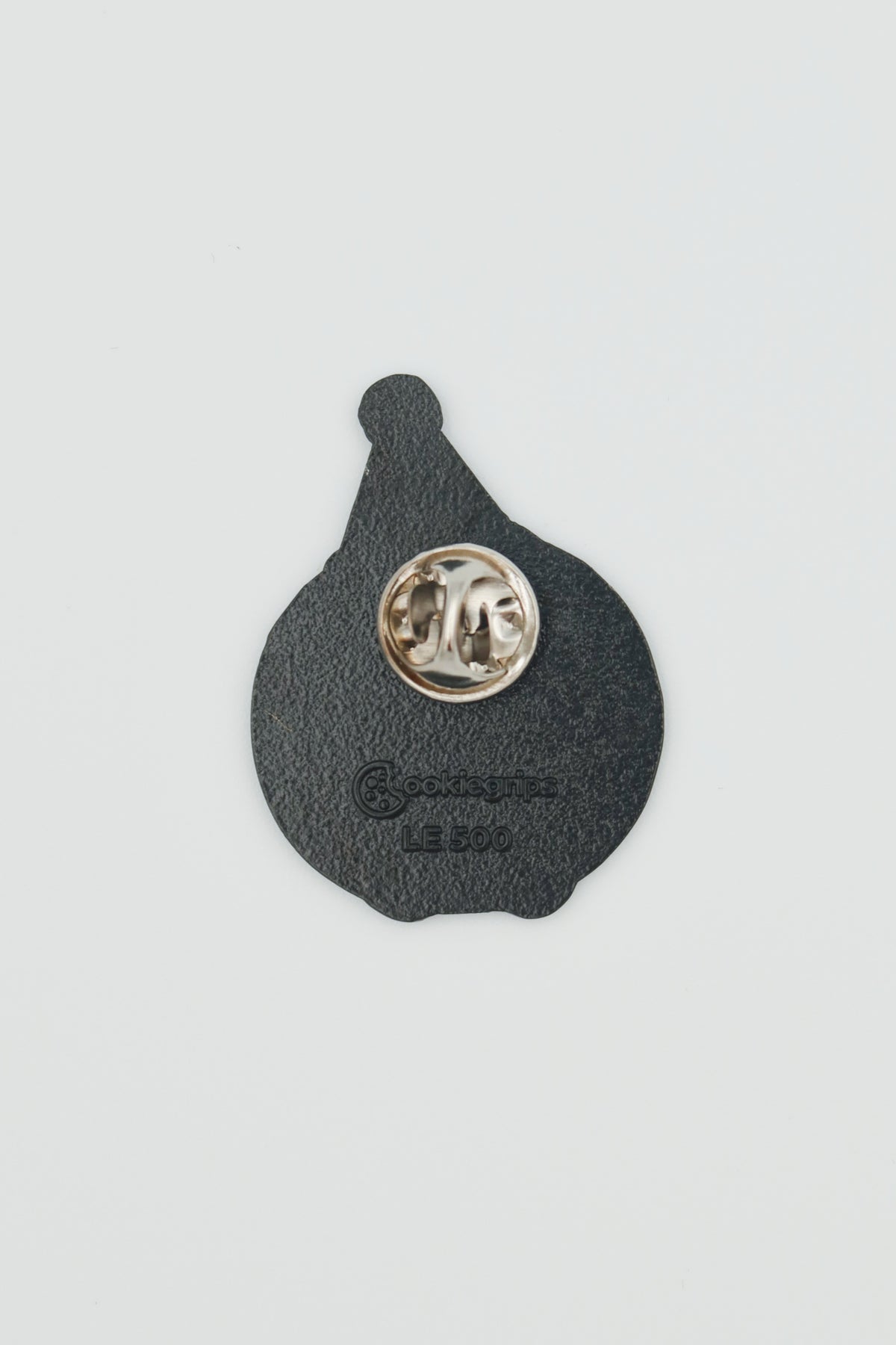 Back of cookiegrips 1st Anniversary Enamel Pin with silver clutch and LE 500 stamp