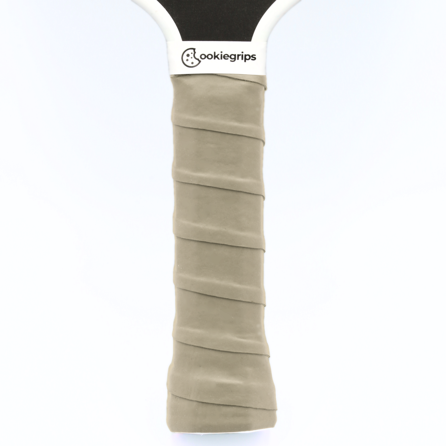 tan cookiegrips pickleball paddle overgrip – soft tacky overgrip applied to paddle handle for comfort and control.
