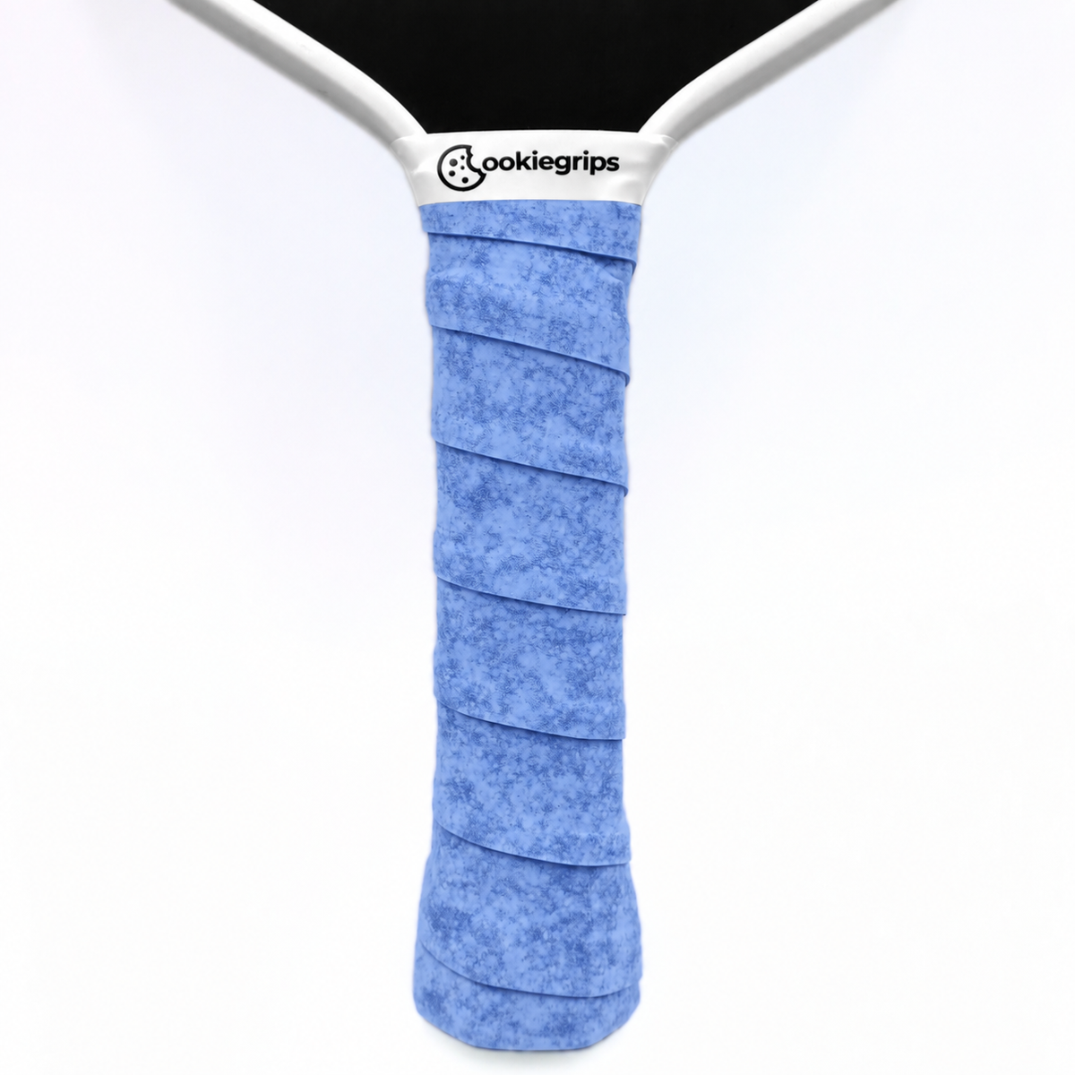 cookiegrips Tough Cookie Frosted Crumb Monster light blue speckled overgrip wrapped on a pickleball paddle handle