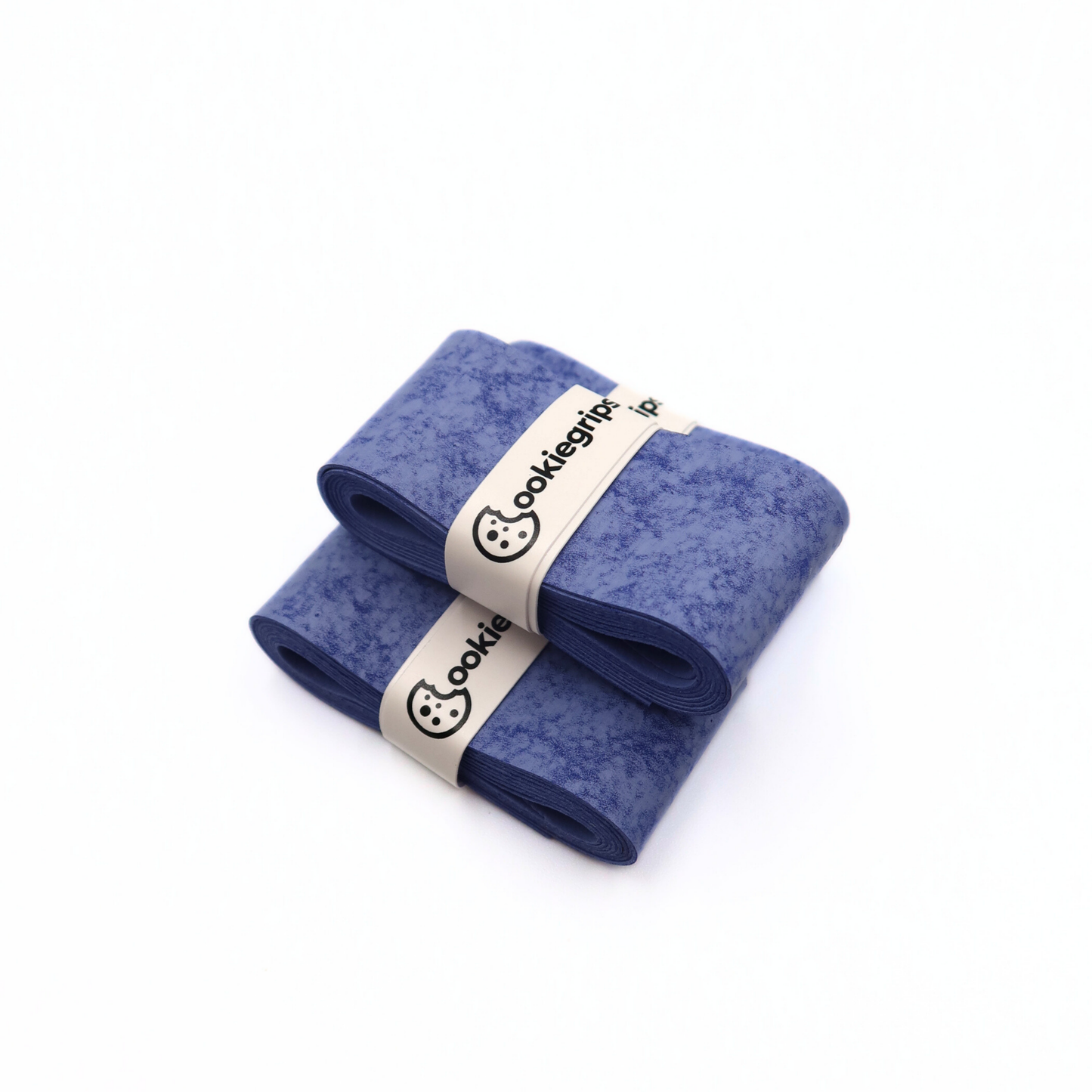 Three Cookiegrips Tough Cookie pickleball and tennis overgrips in speckled blue, rolled and banded with white Cookiegrips logo wraps on a white background.