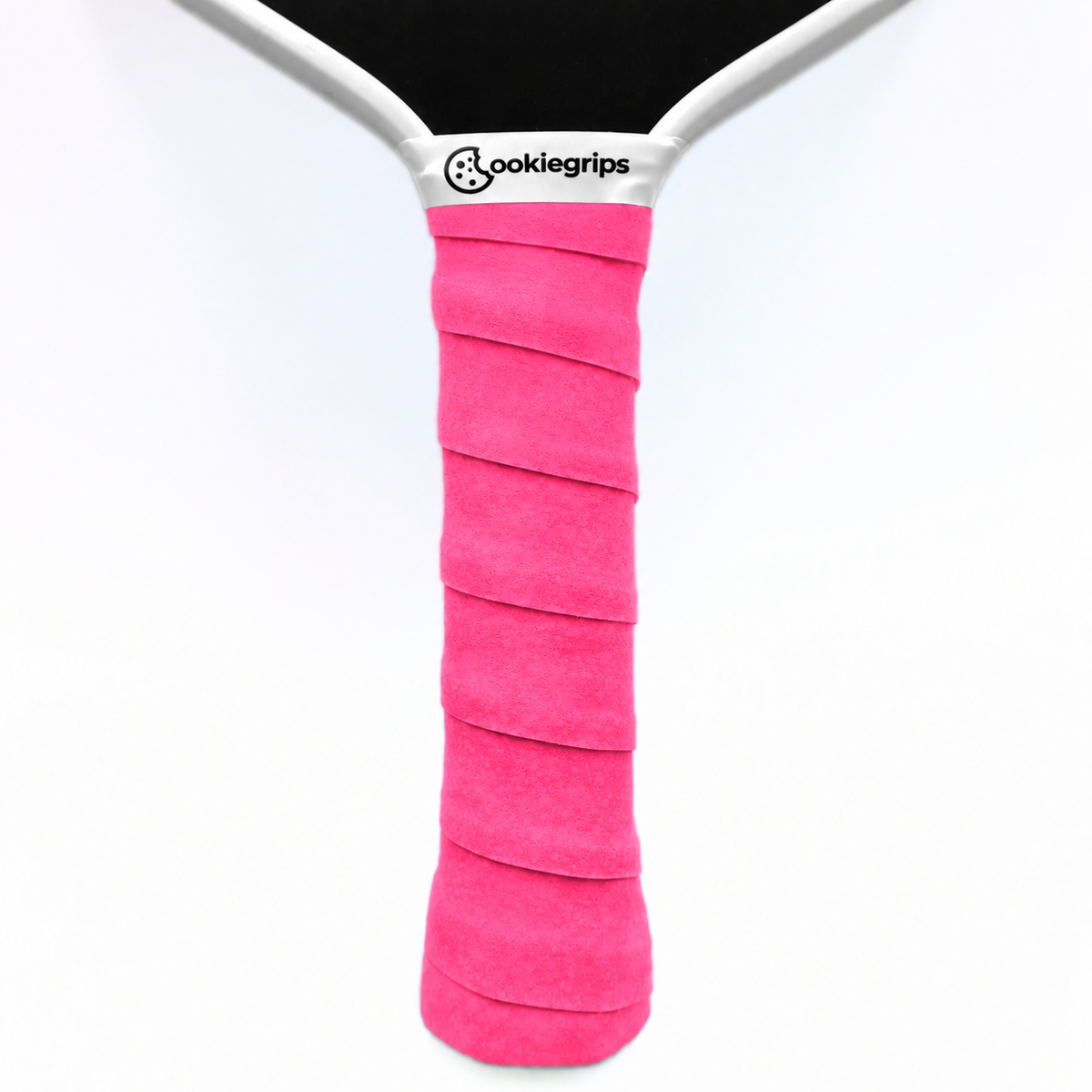 cookiegrips Tough Cookie Glowberry Crunch bright pink overgrip wrapped on a pickleball paddle handle
