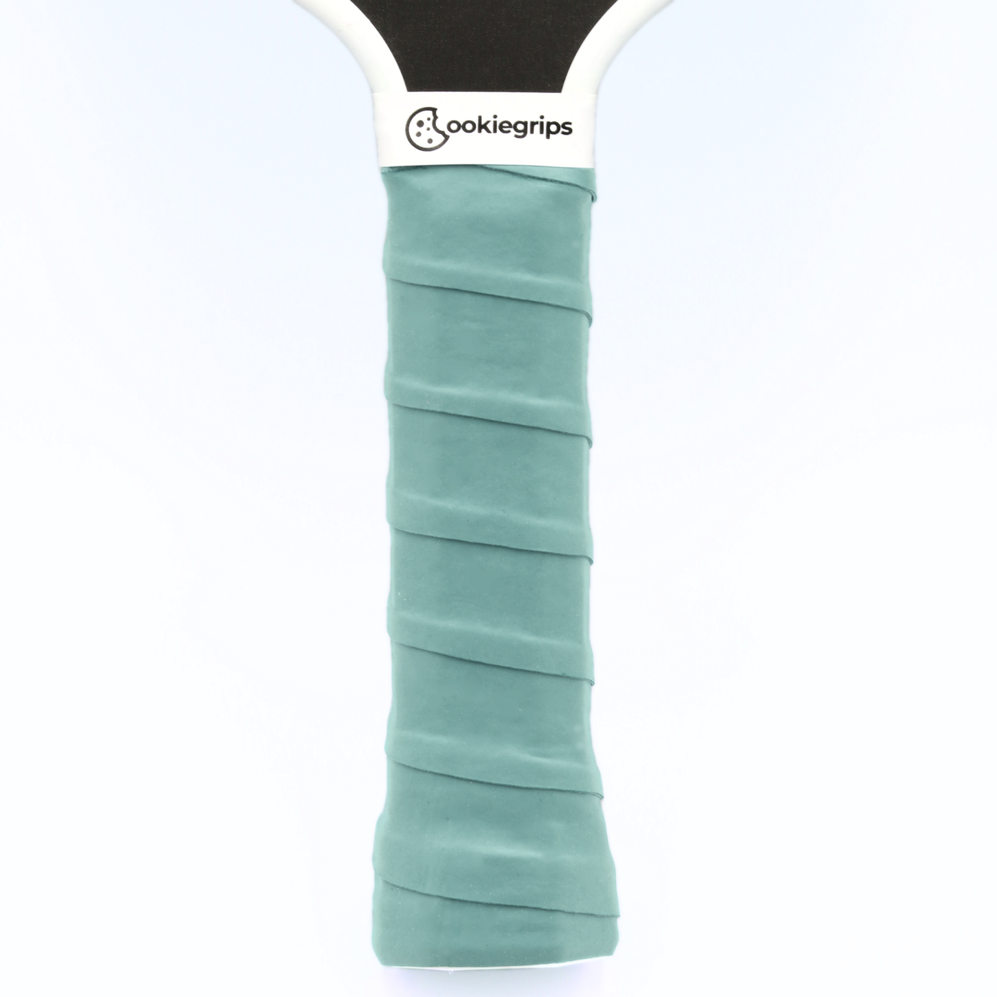 cookiegrips light teal turquoise green pickleball overgrip wrapped on paddle handle — tacky grip tape for comfort and control.