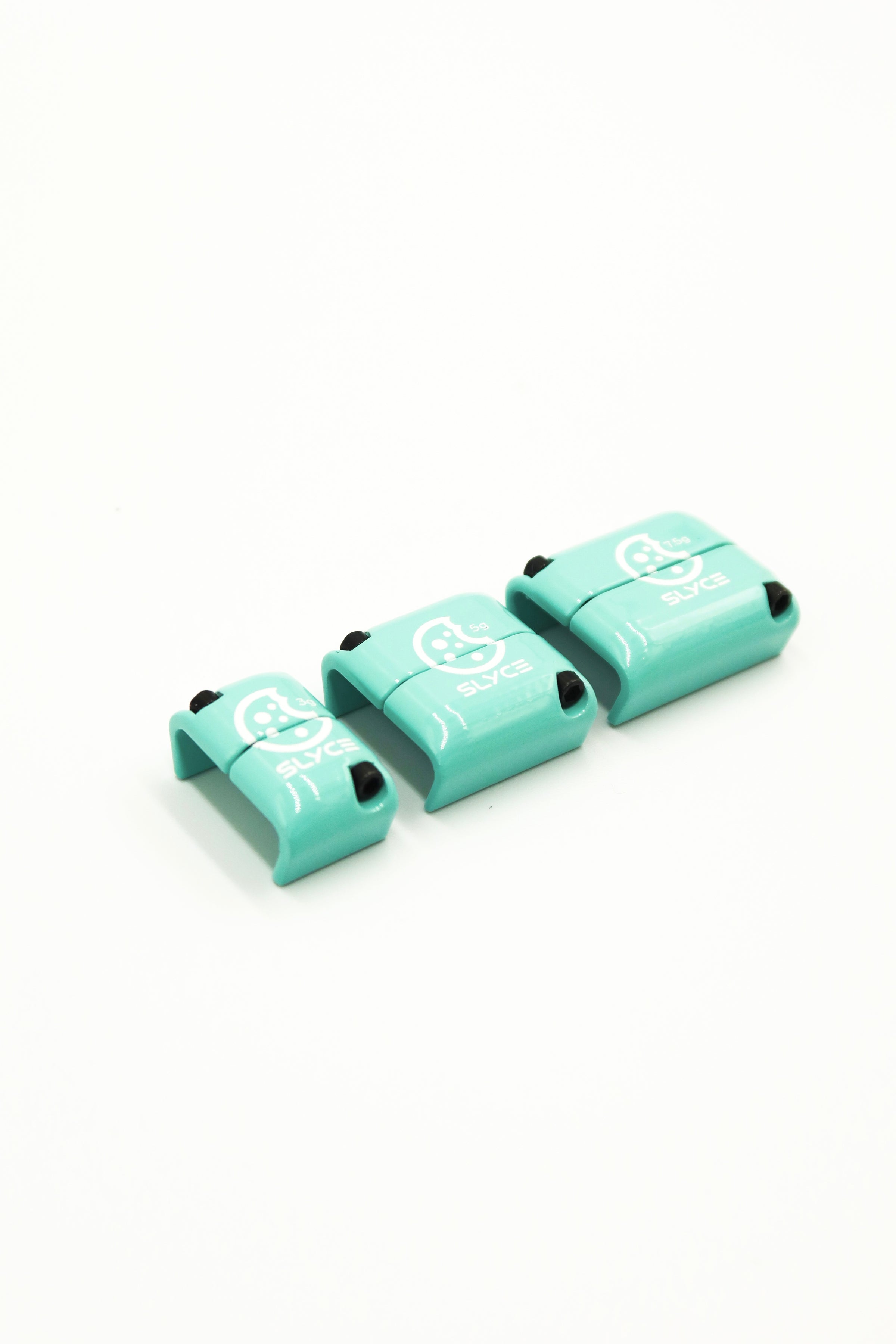 three turquoise cookiegrips x slyce slydr adjustable removable clamp weights with a white cookie logo